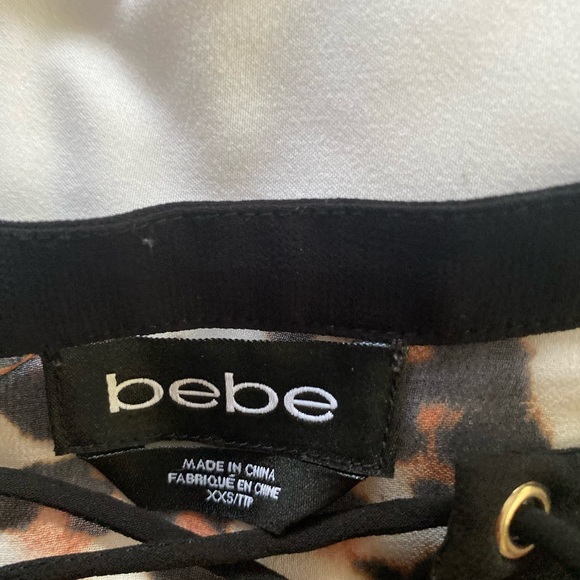 BEBE animal print lace up sleeveless sheer blouse size xx small - Picture 5 of 5